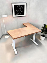 Load image into Gallery viewer, Solid wood L-shaped standing desk with natural rubberwood top and white steel legs