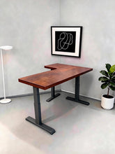 Load image into Gallery viewer, Walnut-finish solid wood L-shaped standing desk with black steel legs in a home office