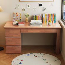 Load image into Gallery viewer, Solid wood study table with 3 drawers in a bright home study, styled with books, typewriter and flower rug