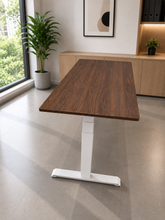 Load image into Gallery viewer, Walnut Finish rubberwood adjustable study table with white T-style legs in a bright office