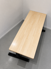 Load image into Gallery viewer, Natural Finish rubberwood adjustable study table with black pedestal base in a minimalist room corner