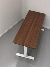 Load image into Gallery viewer, Solid wood height adjustable study table shown at child and adult heights