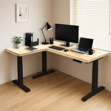 Load image into Gallery viewer, Natural solid rubberwood L-shaped standing desk with black steel legs in a home office