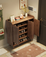 Load image into Gallery viewer, Black walnut wooden shoe cabinet with three doors open showing tiered shoe shelves