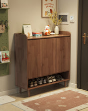 Load image into Gallery viewer, Black walnut wooden shoe cabinet, three-door 100cm model, styled in an entryway