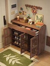Load image into Gallery viewer, Ventilated shoe cabinet with drawers and slatted doors open showing tiered shoe shelves