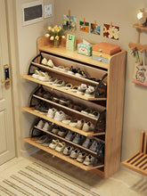 Load image into Gallery viewer, Narrow shoe cabinet Singapore in natural wood with all three tipping tiers open, full of shoes