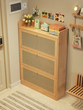 Load image into Gallery viewer, Narrow shoe cabinet in natural wood, 24cm deep with three woven cane-pattern tiers