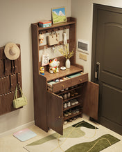 Load image into Gallery viewer, Tall shoe cabinet in black walnut with drawers and doors open, shoes on five internal tiers