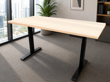 Load image into Gallery viewer, Maple laminate adjustable standing desk with black legs, front view